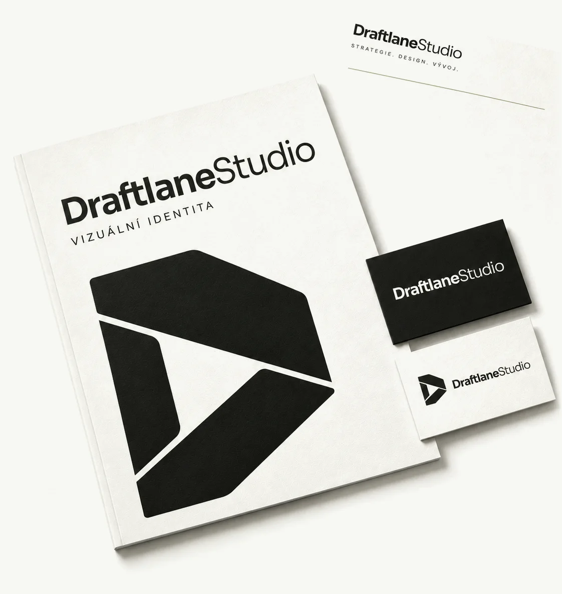 Tiskoviny a vizitky s vizuální identitou DraftlaneStudio.